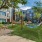 Outdoor turf with hammocks, a fountain, and nearness to pool